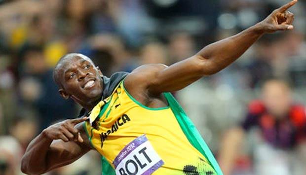 Usain Bolt participa de competição na Praia do Leme
