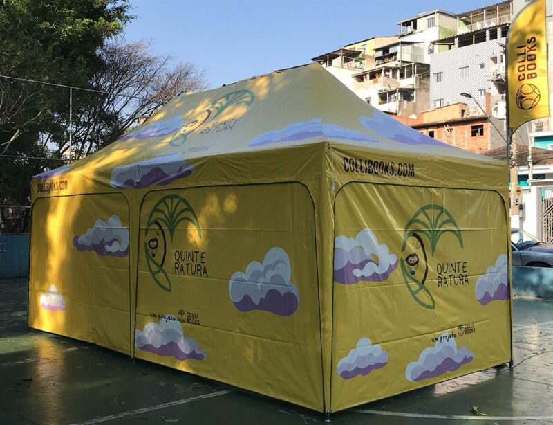 Projeto Quinteratura Foto mostra uma tenda amarela escrita