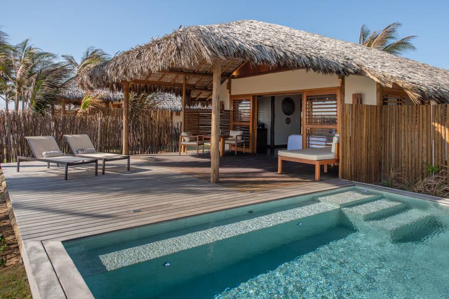 Bangalôs com piscina dão clima de casa de praia Bangalôs com piscina dão clima de casa de praia