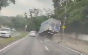 Briga de trânsito provoca acidente entre caminhão e carro. Veja o vídeo